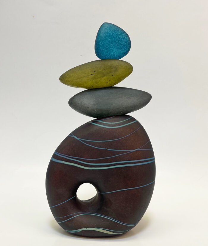 One-of-a-kind Sculpture Another view of handmade art glass cairn with hole sculpture by Melanie Leppla.