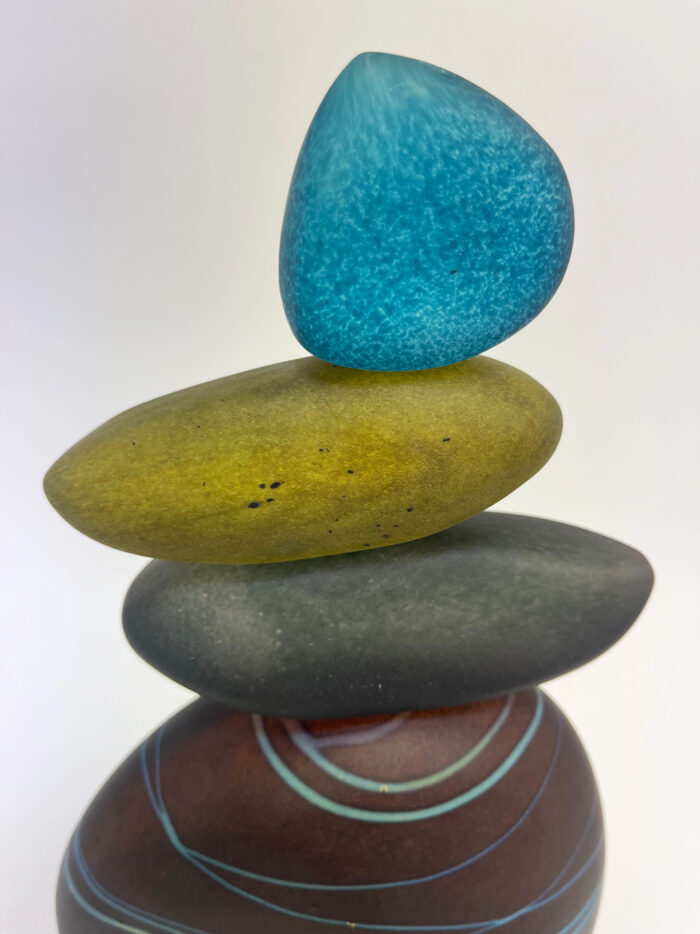 Detail of glass 'rocks' on Melanie Leppla's unique glass cairn sculpture.