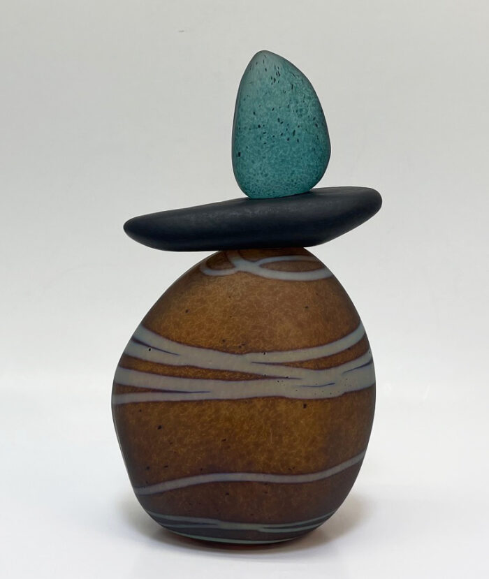 Another view of Melanie Leppla's gorgeous handmade glass cairn in black, bronze and teal.